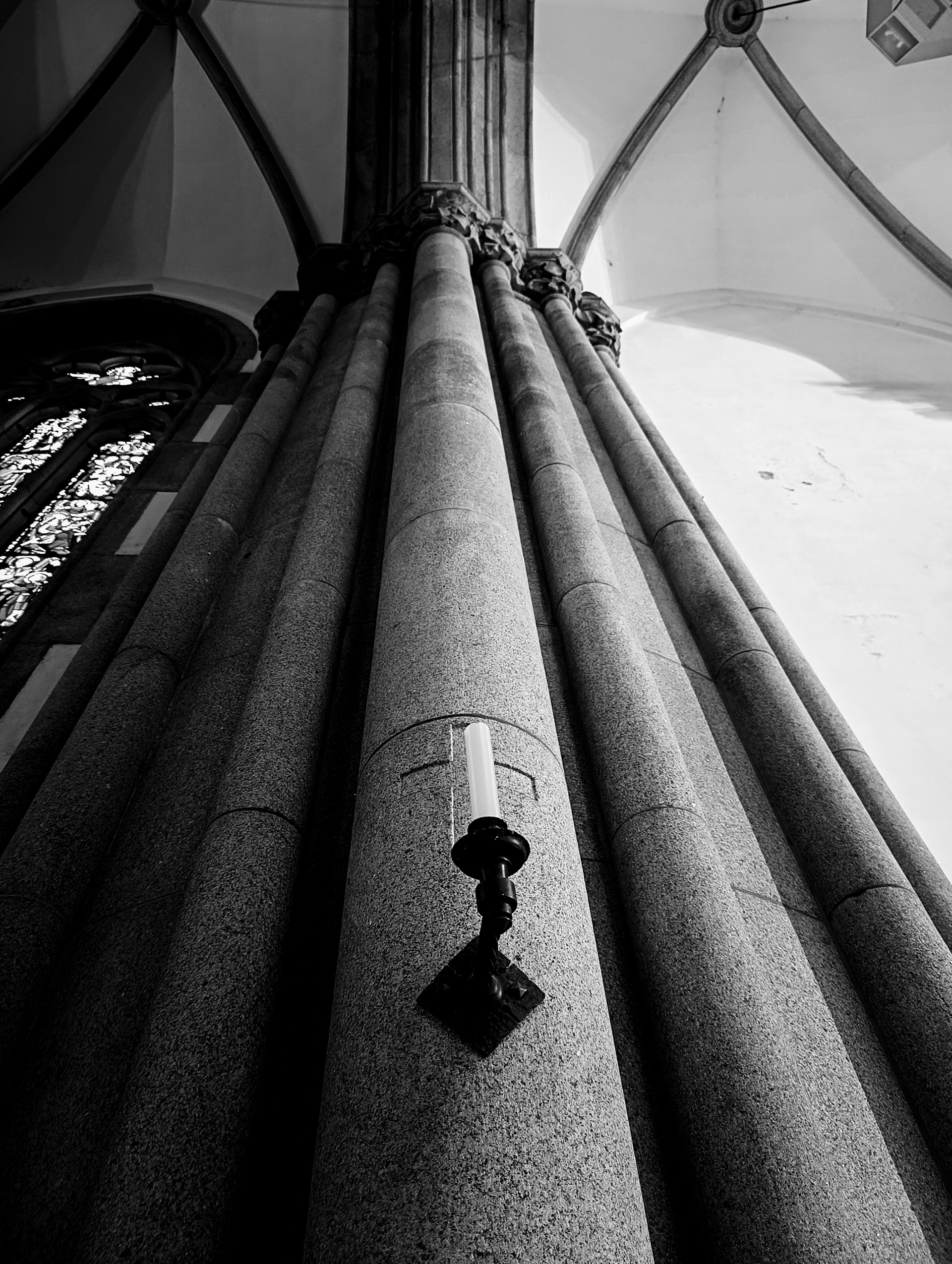 a black and white photo of a tall building