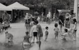 Families enjoying a day of outdoor activities and games.