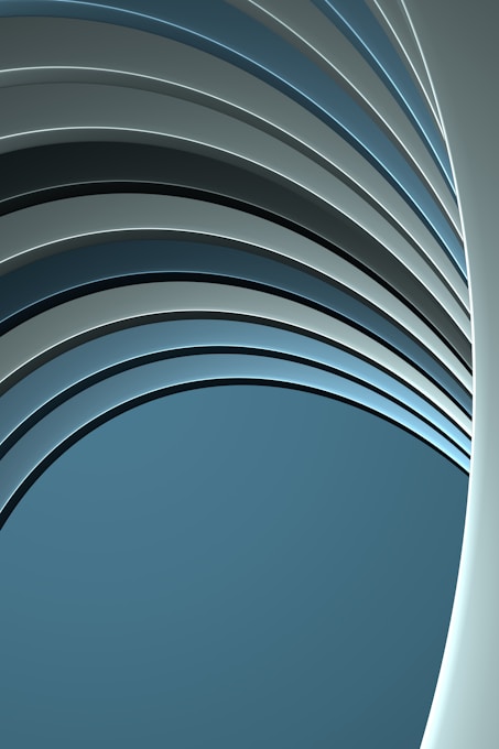 a blue and gray abstract background with curved lines