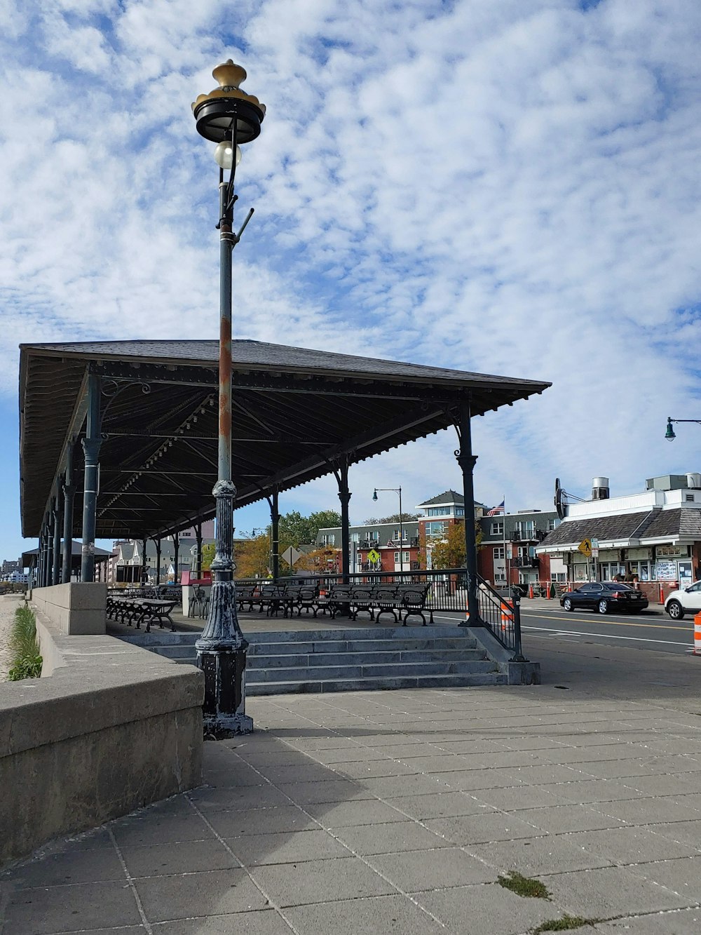 a light pole with a lamp on top of it