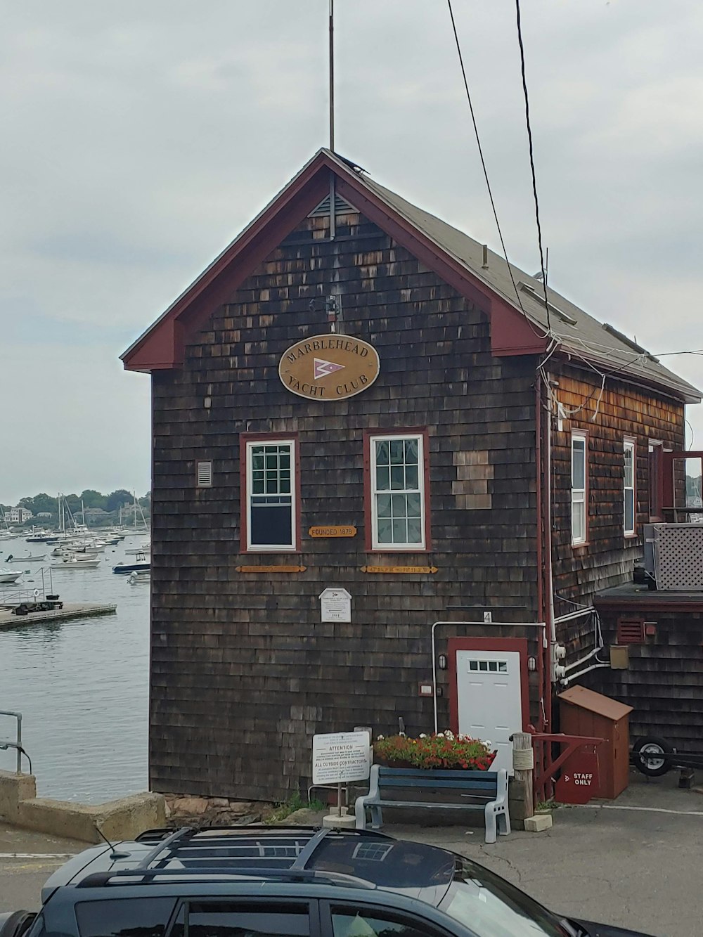 a small building with a sign on the side of it