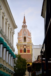 a tall building with a clock on the top of it