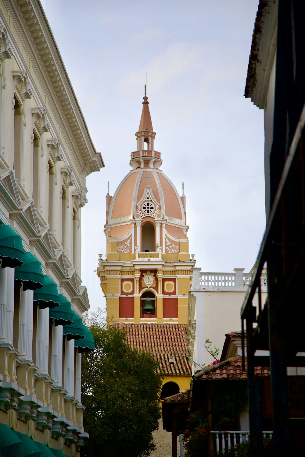 a tall building with a clock on the top of it