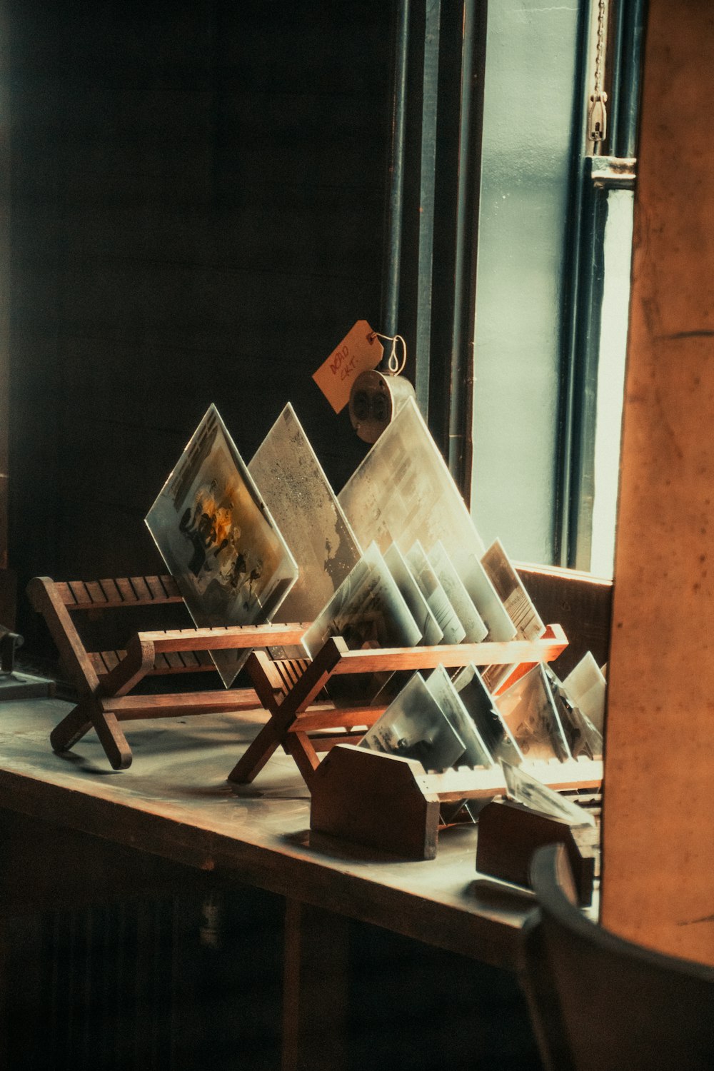 a group of chairs sitting on top of a wooden table