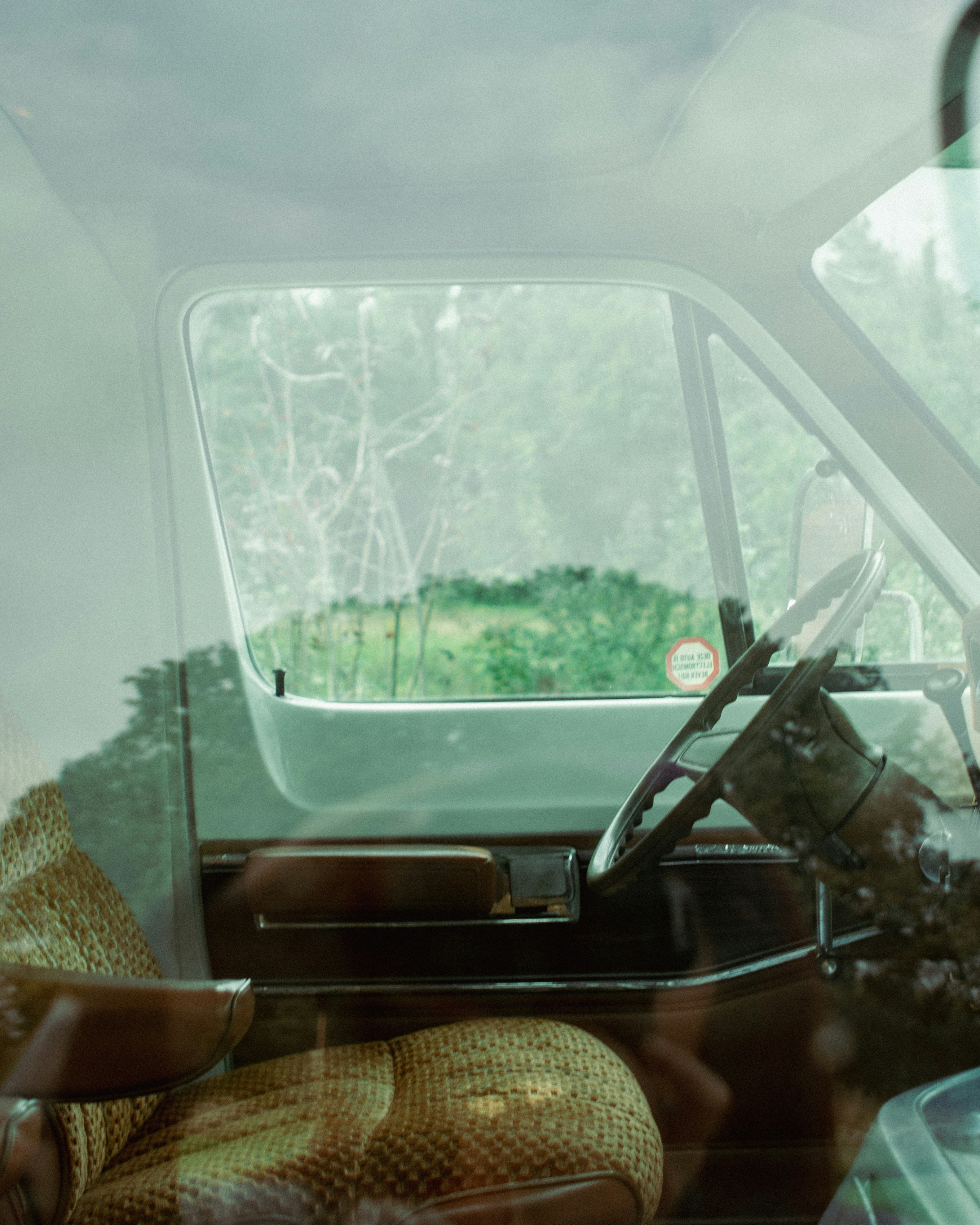 the interior of a truck with a steering wheel
