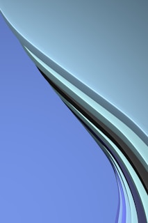 A smooth, flowing design composed of curving lines in various shades of blue, black, and white, creating an abstract and futuristic appearance.