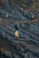 Sunrise horseback riding over the unique rock formations of Cappadocia