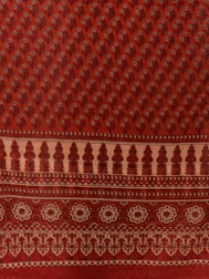 A vibrant display of traditional Indian motifs in deep saffron and lotus pink hues.