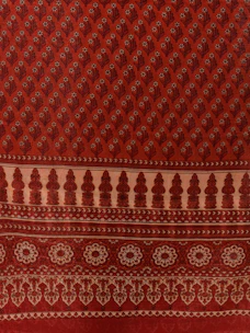 A vibrant display of traditional Indian motifs in deep saffron and lotus pink hues.