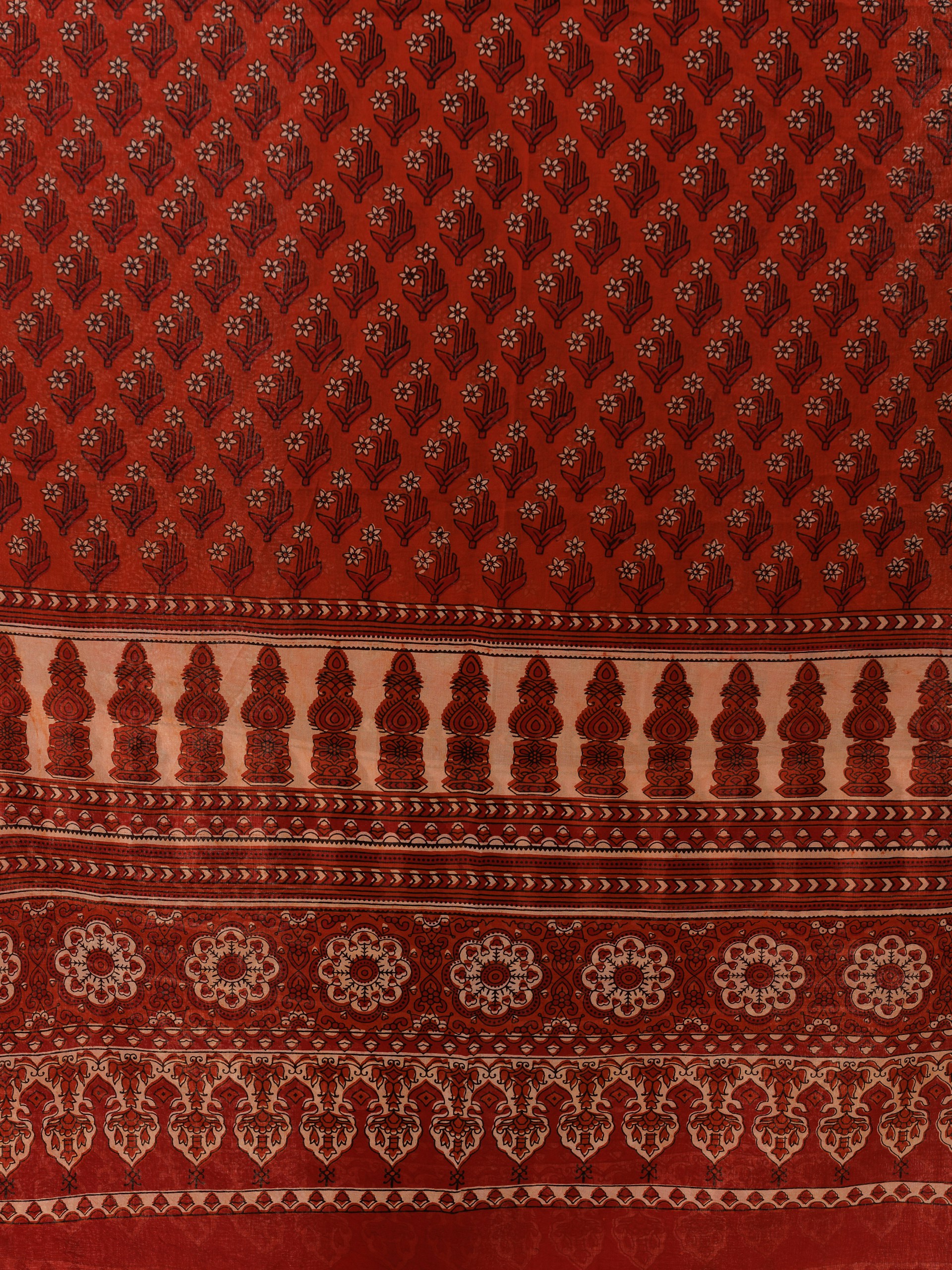 a close up of a red and white cloth
