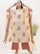 Elegant model showcasing a bespoke pure silk Punjabi suit with intricate hand-painted designs