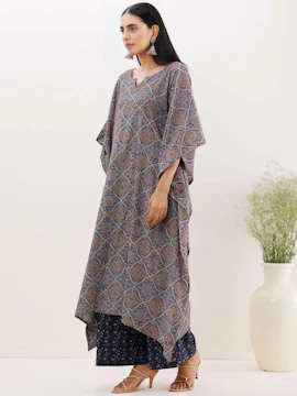 Modern Moroccan caftan with sleek lines and subtle geometric patterns.
