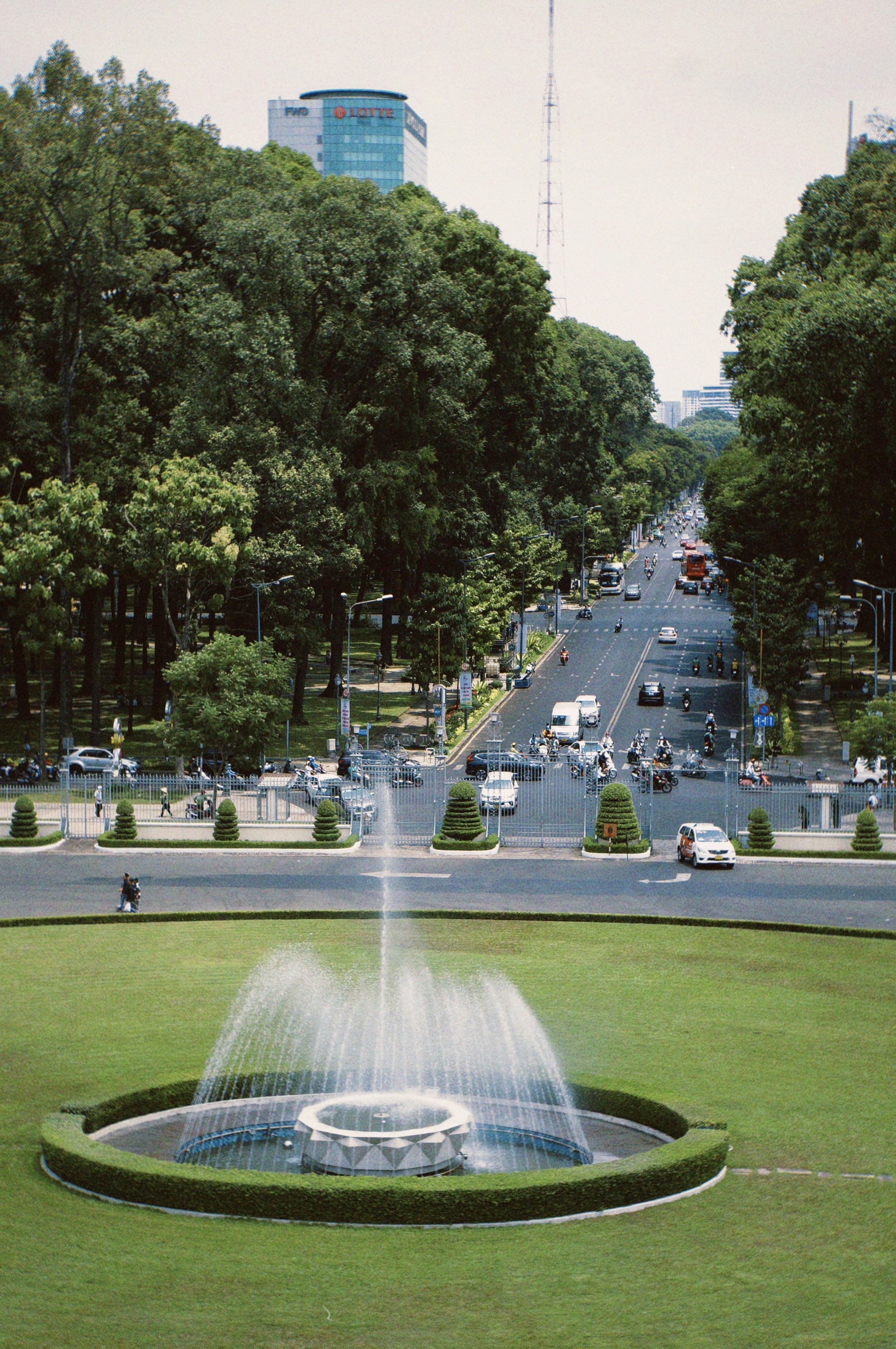a fountain in the middle of a park