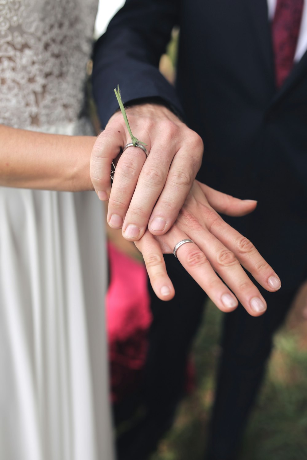 a close up of a person holding a person's hand