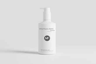 a bottle of white plastic bottle on a white background
