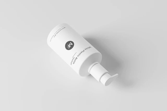 A tube of cream on a white surface.