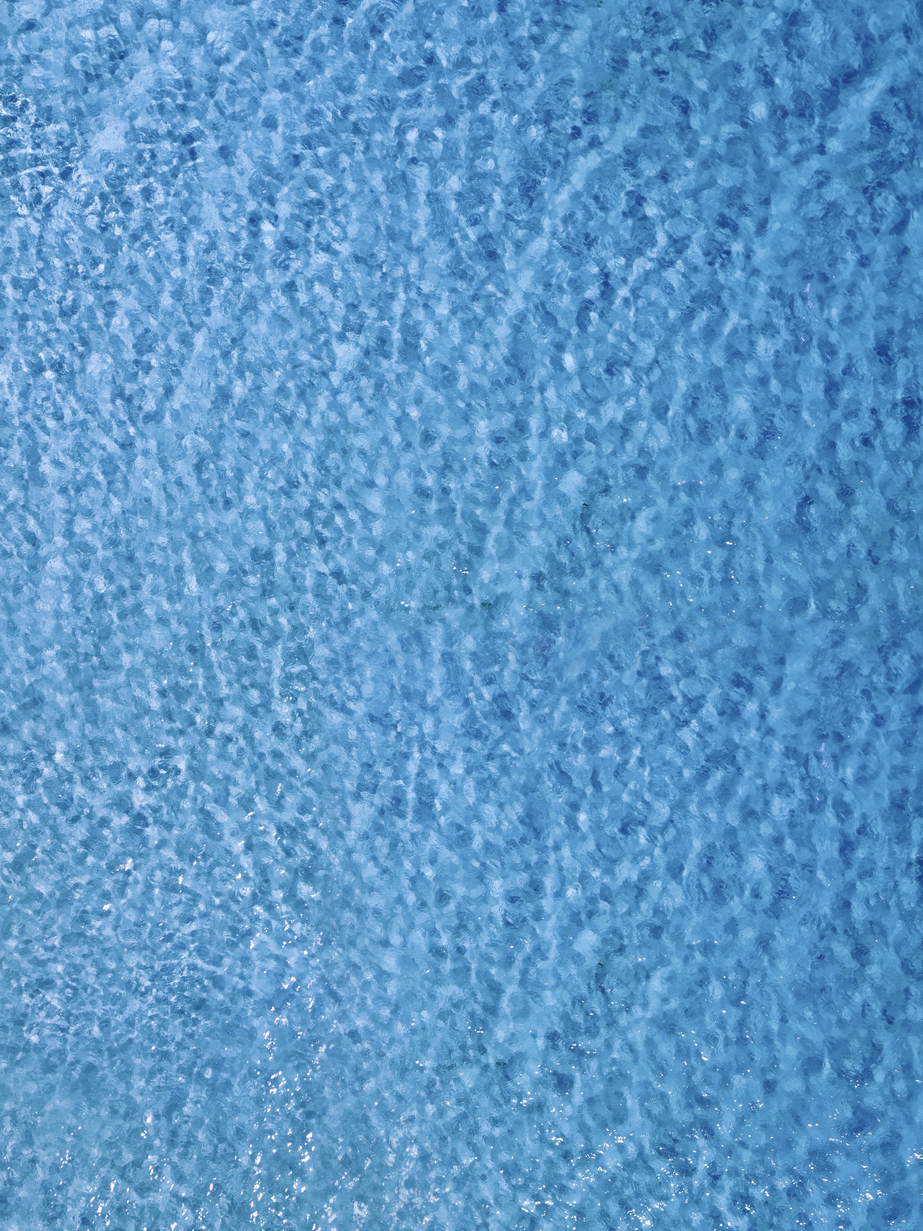 an airplane flying over a body of water