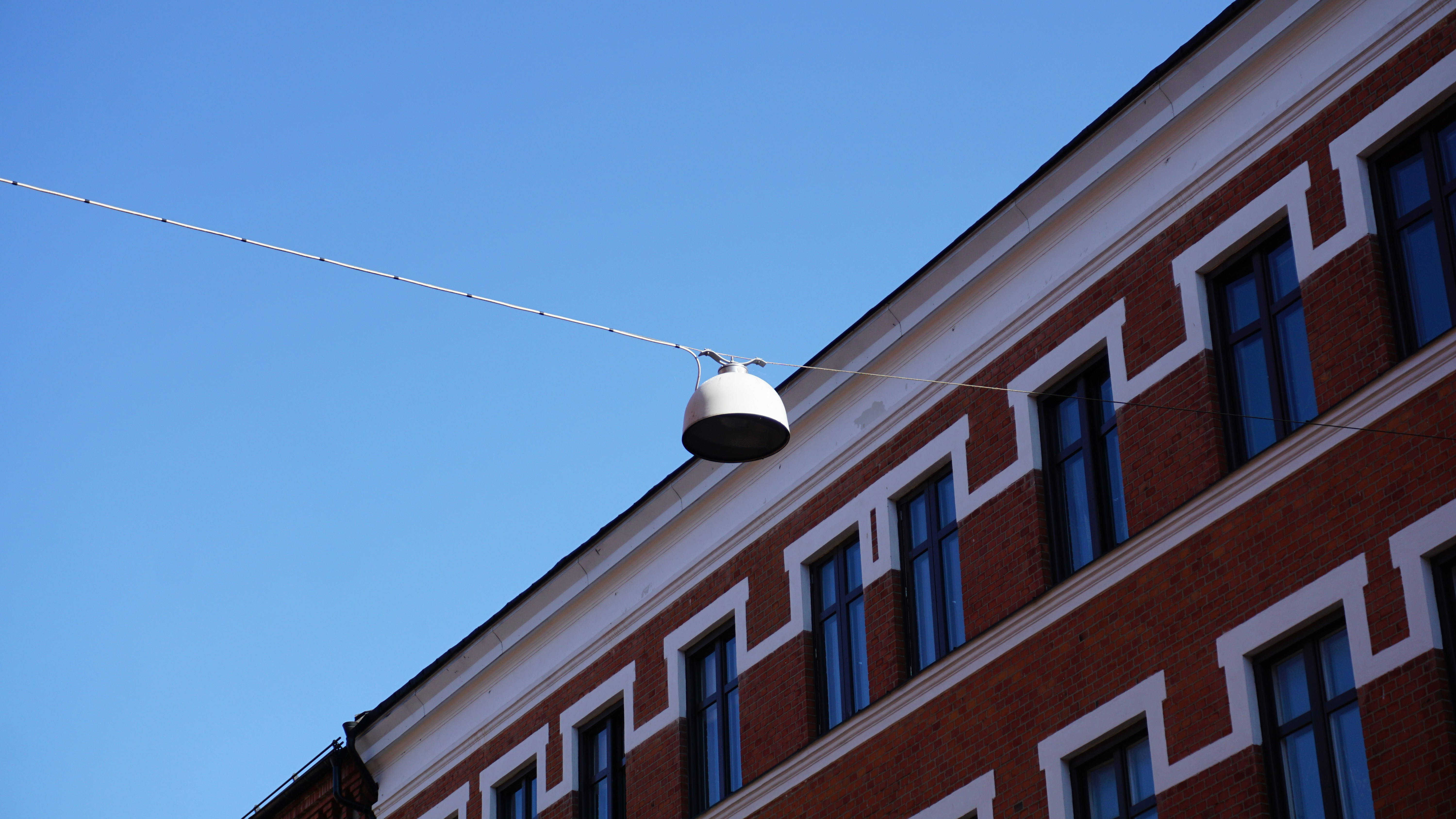 a street light hanging off the side of a building