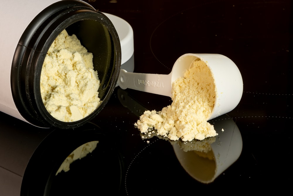 a close up of a container of food on a table