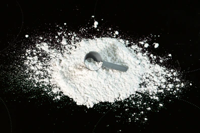 Heap of bright white soda ash powder ready for shipment.