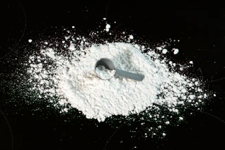 Heap of bright white soda ash powder ready for shipment.