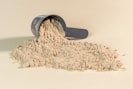 a scoop of powder sitting on top of a table