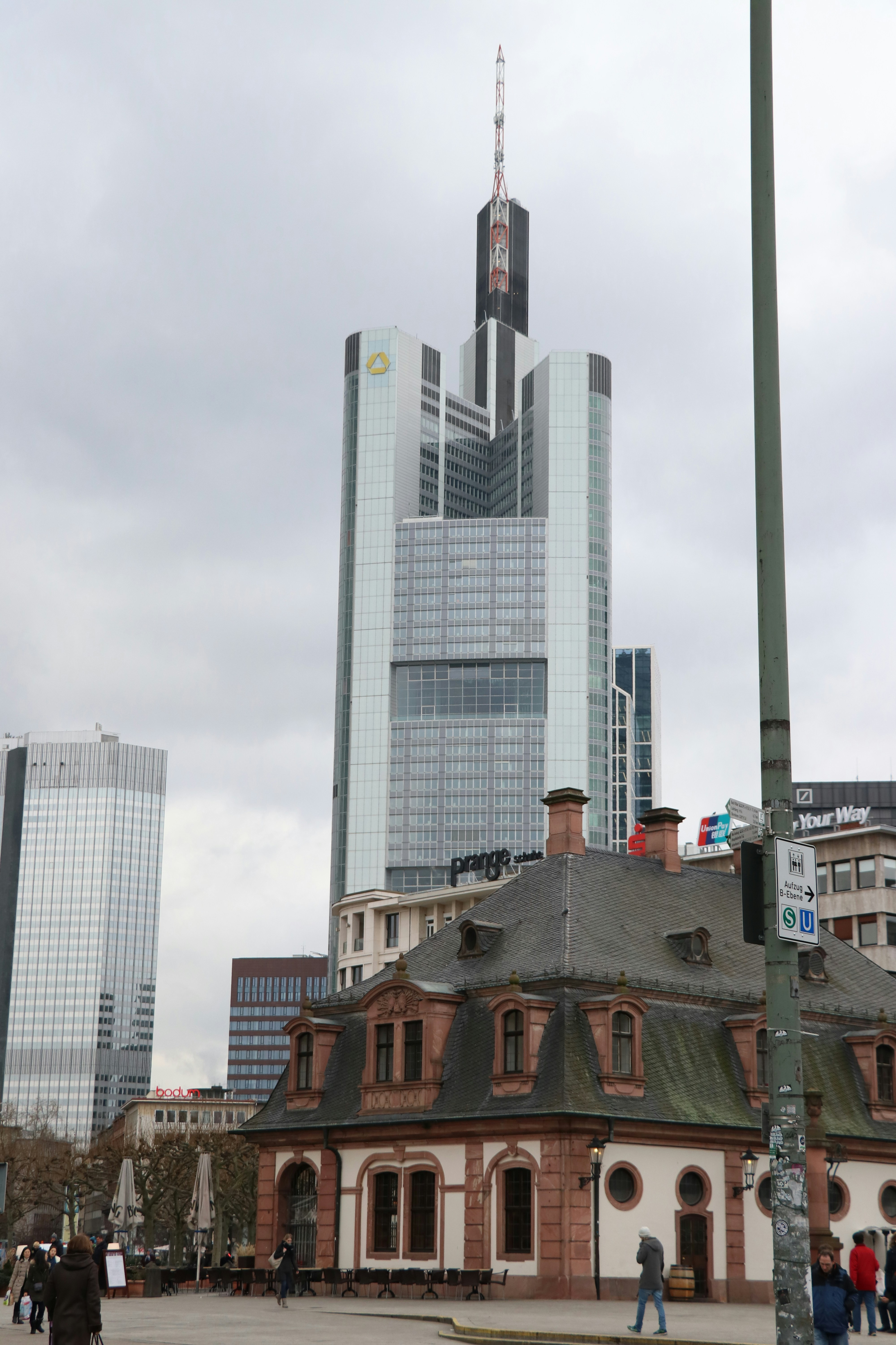 a group of people standing outside of a building