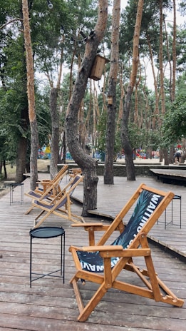 Outdoor deck with comfortable seating overlooking the whispering pine trees.