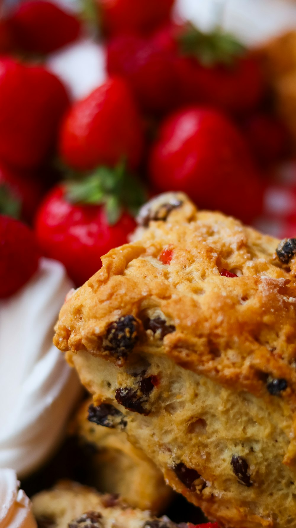 a close up of a plate of food with strawberries