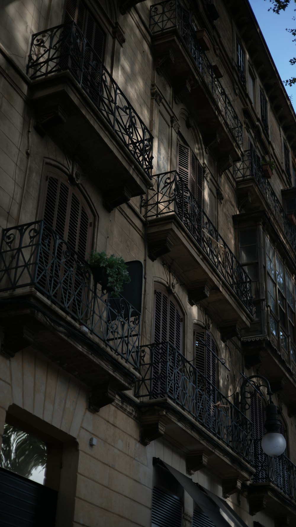 a tall building with balconies and balconies on the balconies