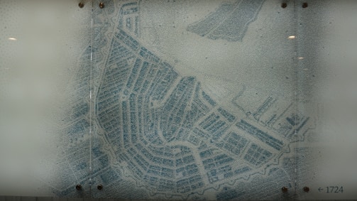 Close-up of a printed city plan with fine details and clear typography.