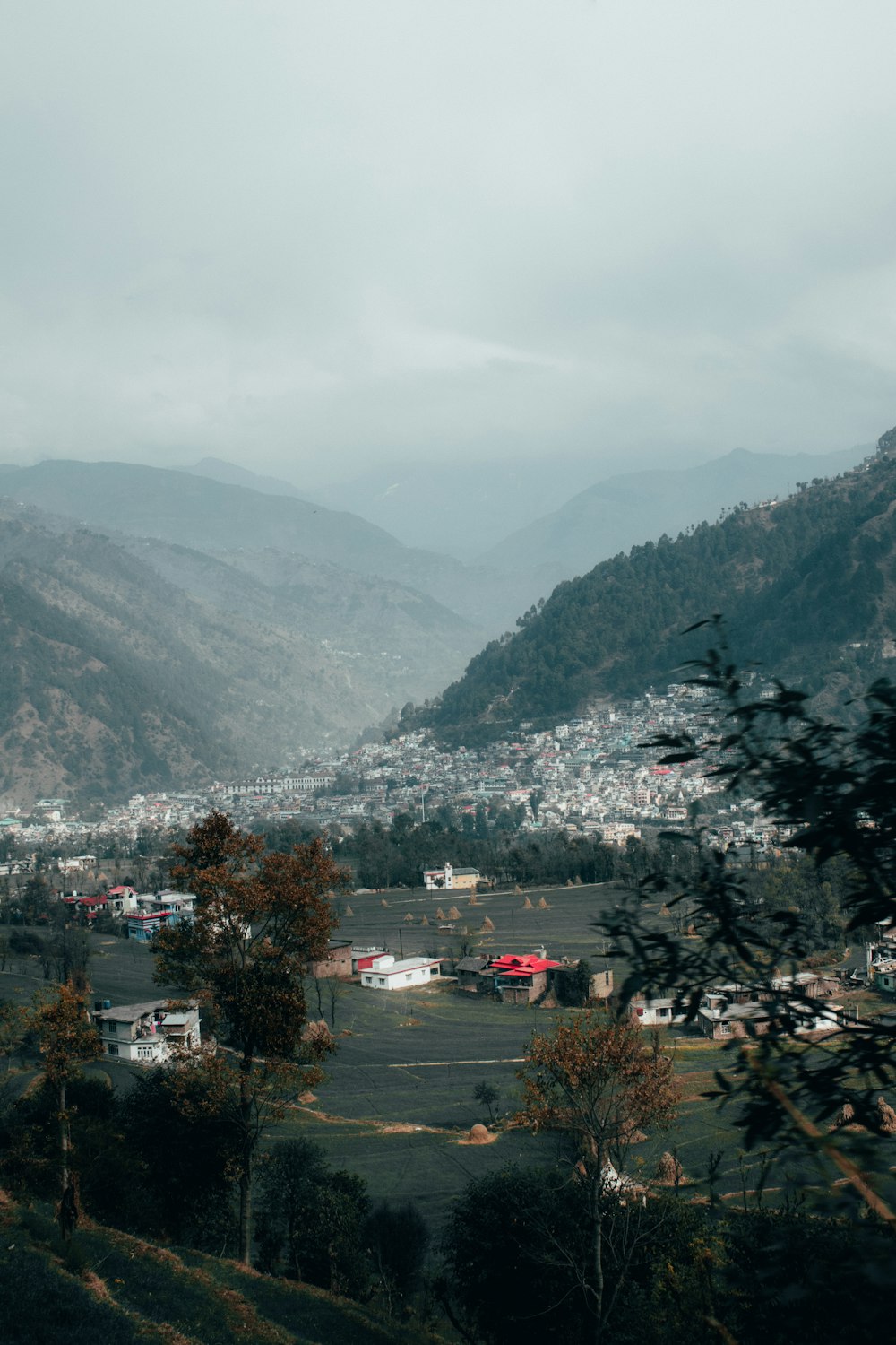 a view of a town in the mountains