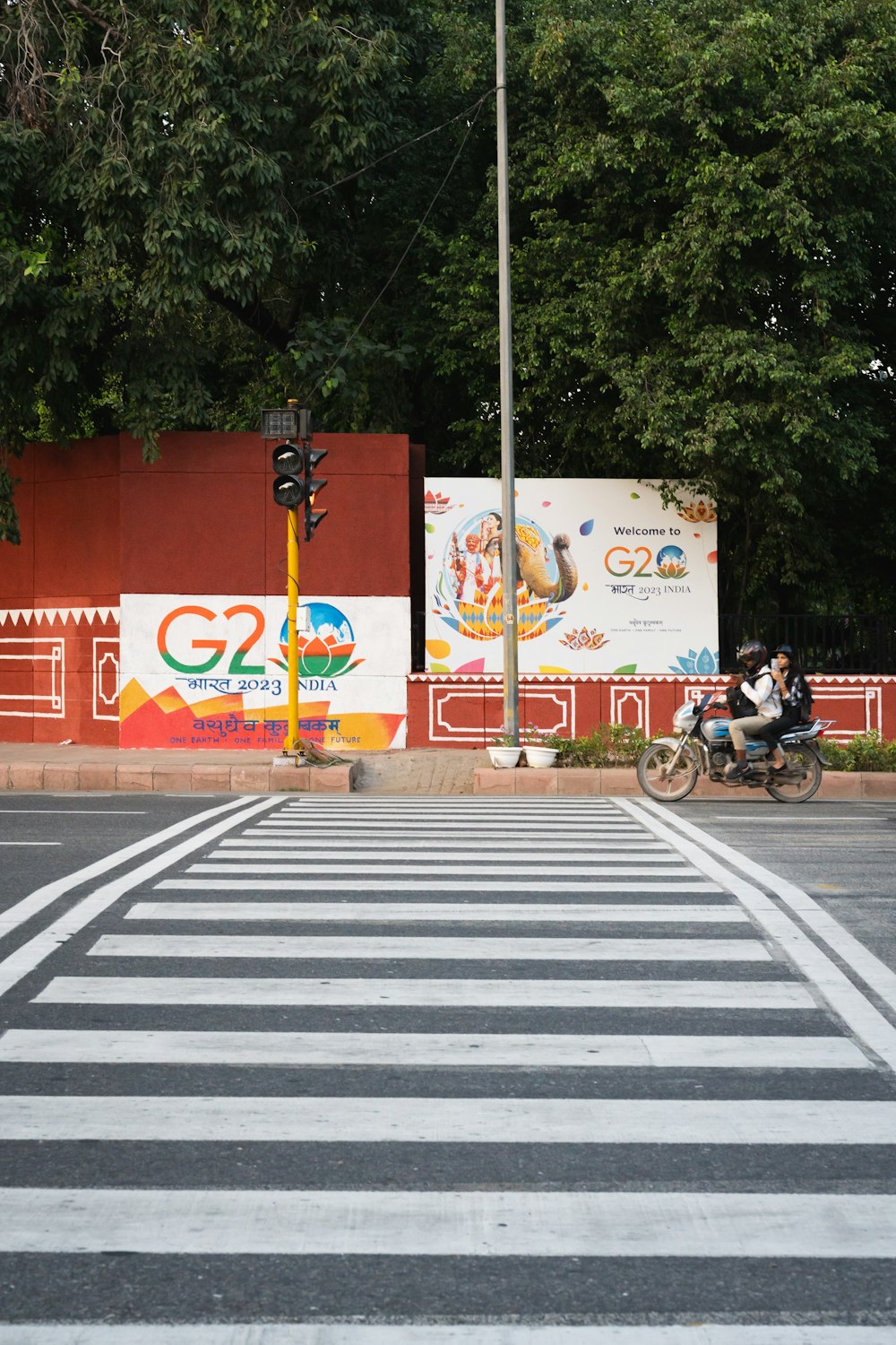 a person riding a bike across a street