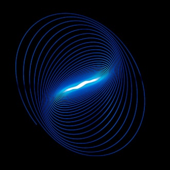 a blue spiral is shown in the dark