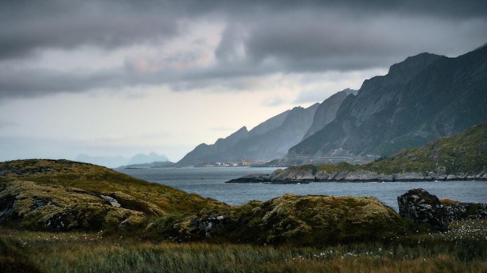 a large body of water surrounded by mountains