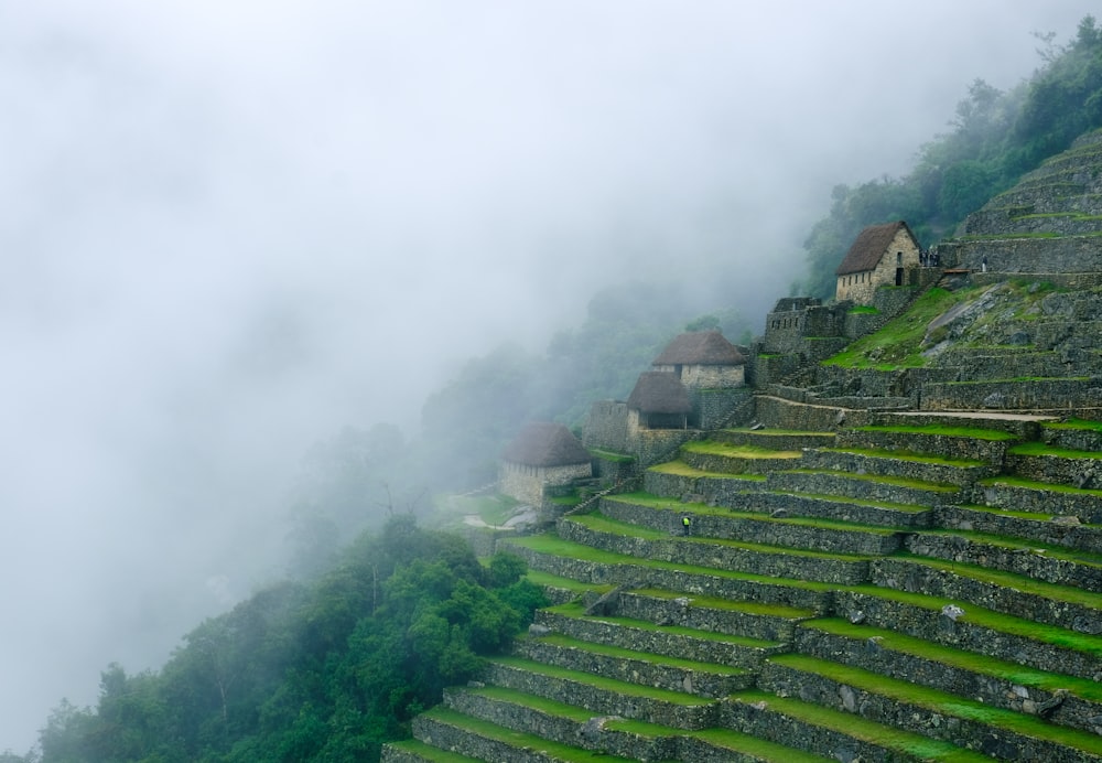 a group of buildings on a mountain side