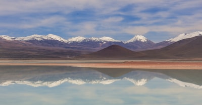 a large body of water surrounded by mountains
