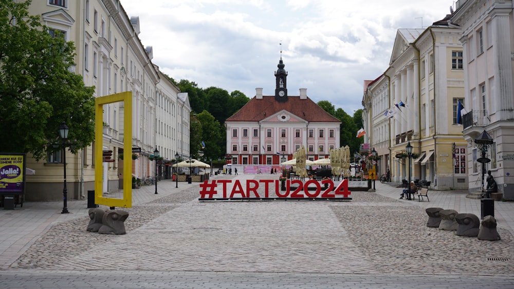 there is a sign that says tartuga in a town square