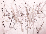 A detailed shot of spontaneous paint splatters and roller strokes in black and white.