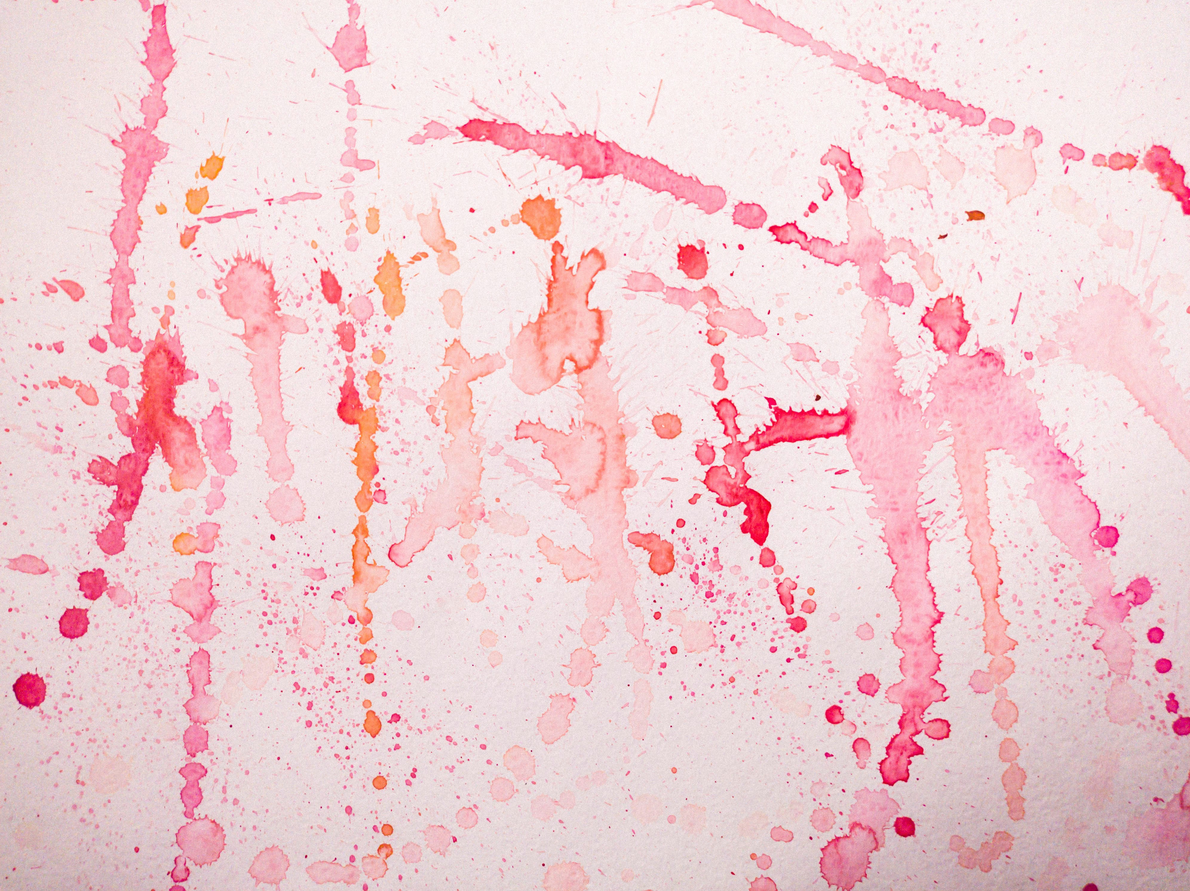 a wall with a lot of paint splattered on it