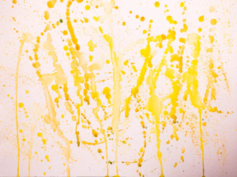 Bright abstract canvas with splashes of yellow and green.