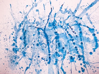 Creative portfolio layout showcasing artwork with dynamic blue highlights.