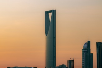 a very tall building in the middle of a city