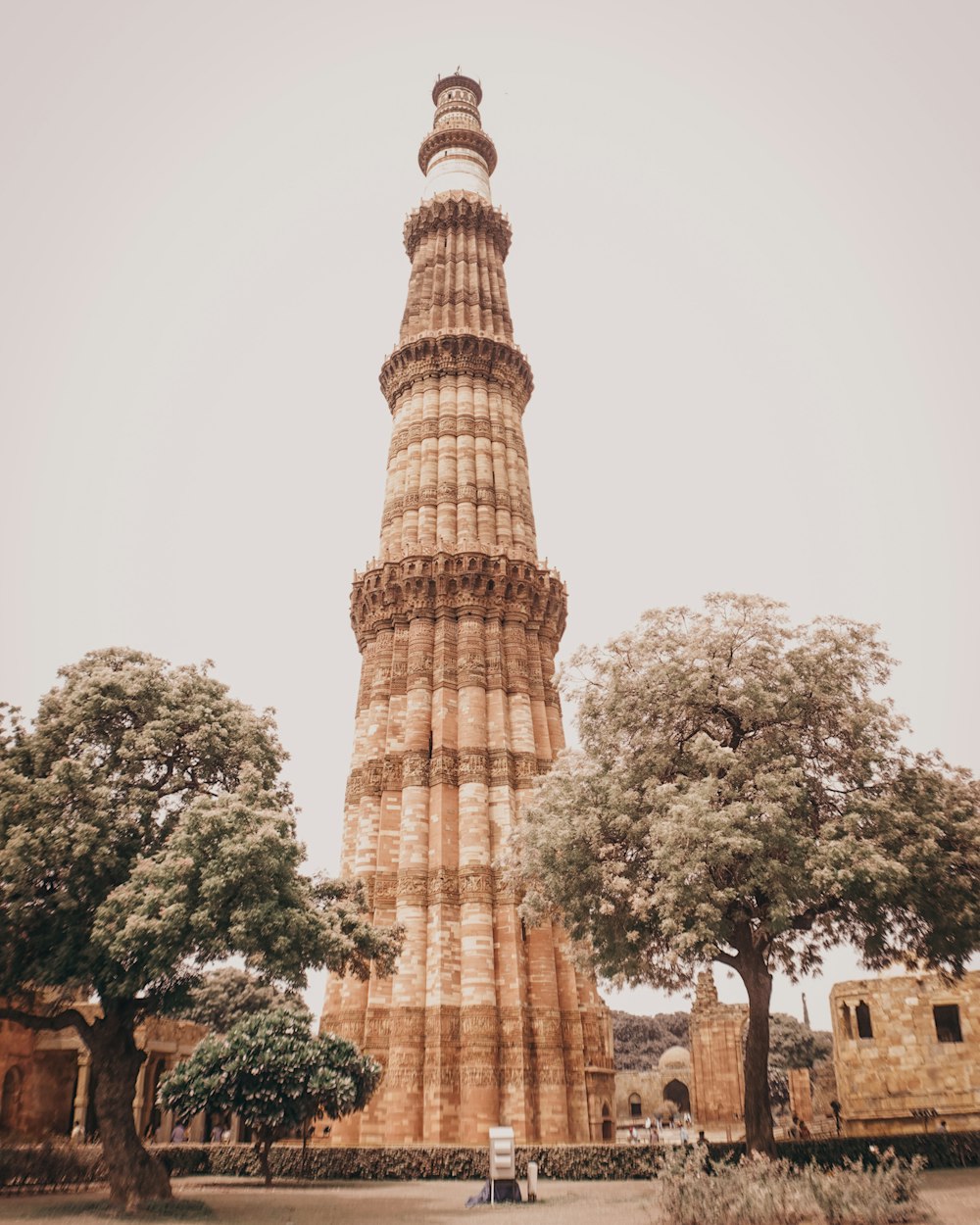 a tall tower with a clock on the top of it