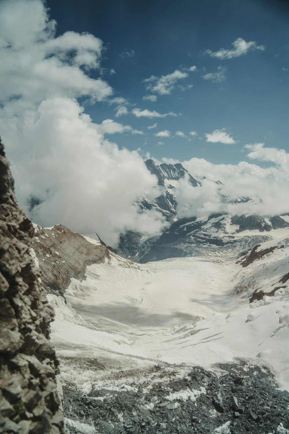 a view of a snow covered mountain from a distance