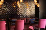 A cozy lounge area featuring plush seating and a rich brown color palette.