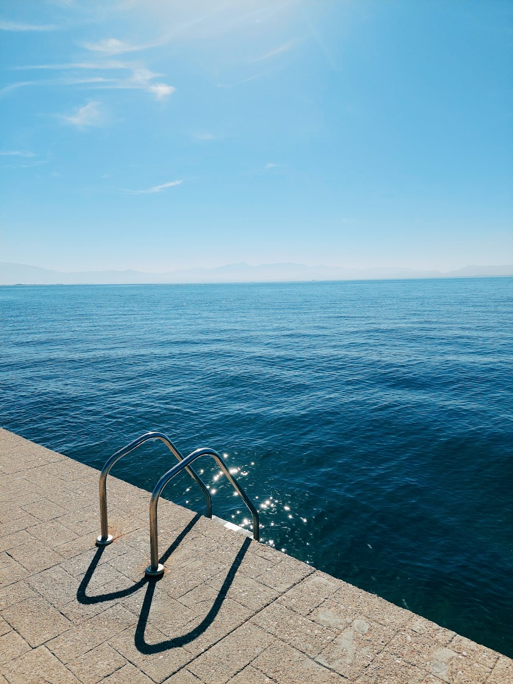 a view of a body of water from a pier