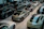 a bunch of cars are parked in a garage