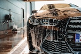 a car is covered in suds