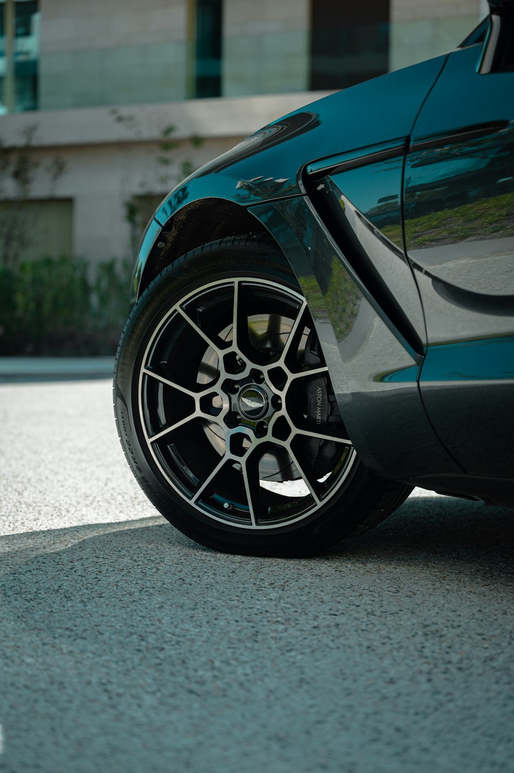 a close up of a car tire on a street